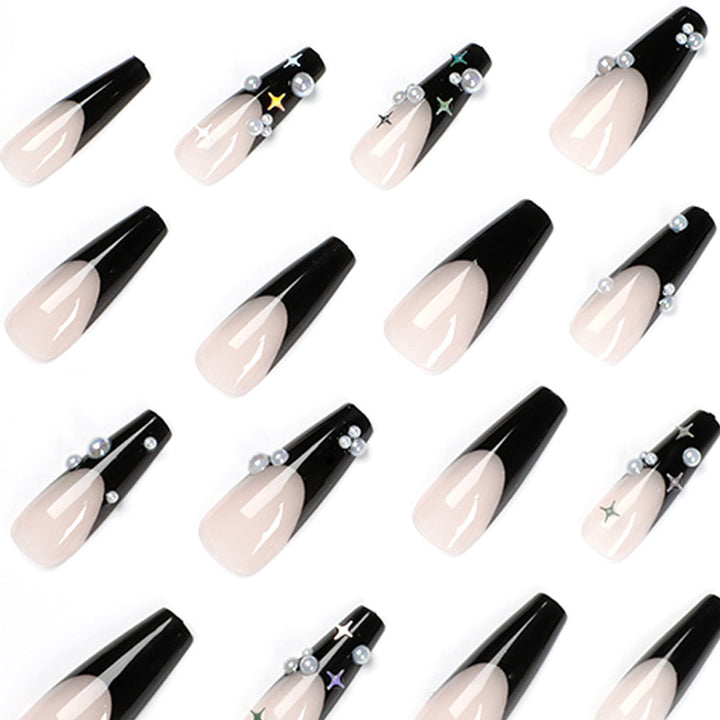 Artificial nail art with pearl and shine elements Bowlift