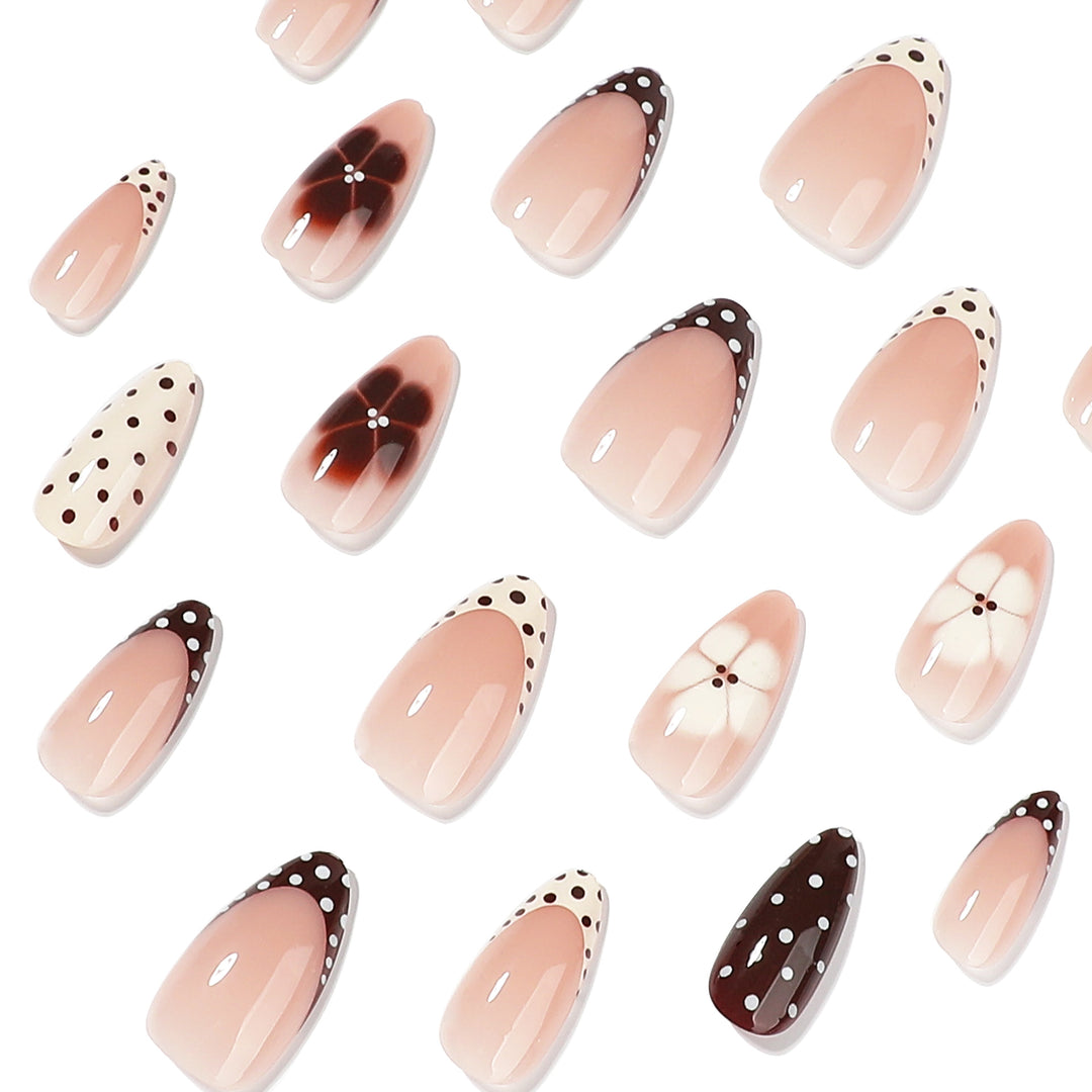Artful nail art with floral design and various patterns Bowlift