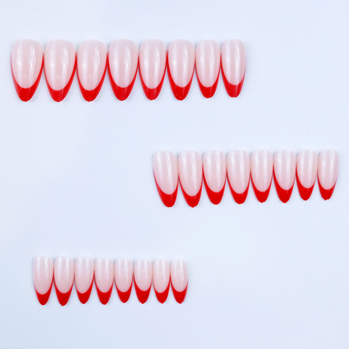 Artificial nails in stylish stiletto design with eye-catching top coat Bowlift