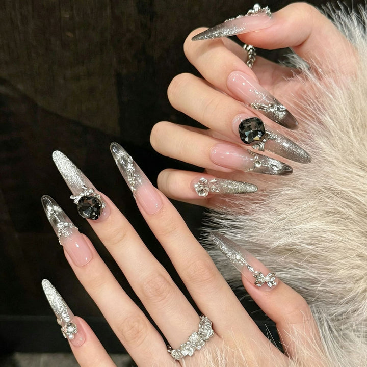 Artistic Stiletto Press-On Nail Art with Glimmering Accents Bowlift