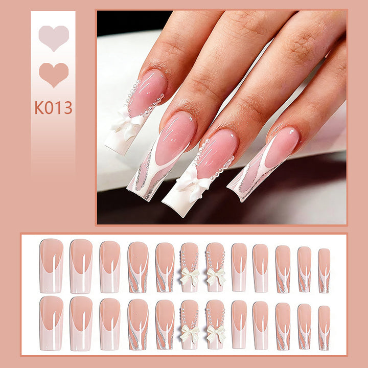 Artificial nail set with elegant bow and pearl decorations Bowlift