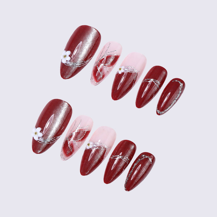 Decorative Press-On Nail Art with Floral Accents Bowlift