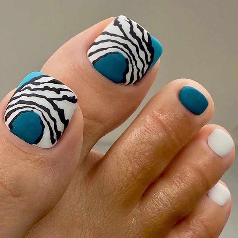 Artful toenail design in modern zebra pattern Bowlift