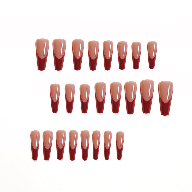Elegant artificial nails with high-gloss finish and prominent French tip Bowlift