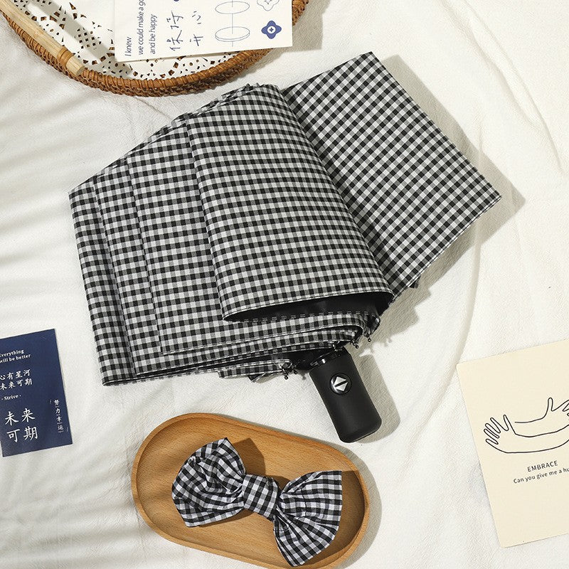 Ladies elegant folding umbrella with classic check pattern Bowlift