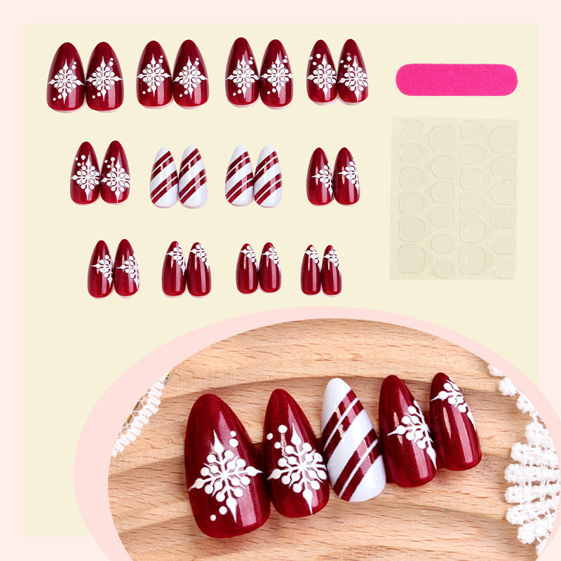 Acrylic Nail Set with Festive Winter Design and Glamorous Accents Bowlift