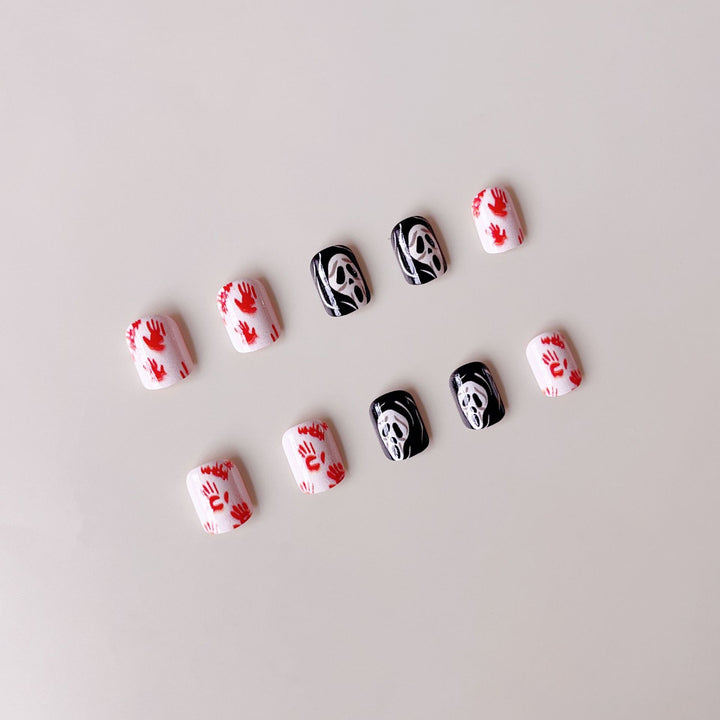 Creative Halloween Nail Art Set with Creepy Designs and Sparkling Accents Bowlift