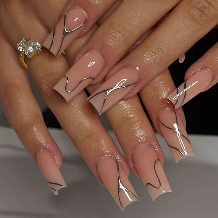 Artificial nail set with elegant 3D designs and high-gloss accents Bowlift