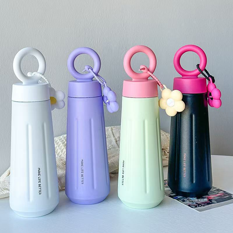 Ladies stylish water bottle with practical carry handle Bowlift
