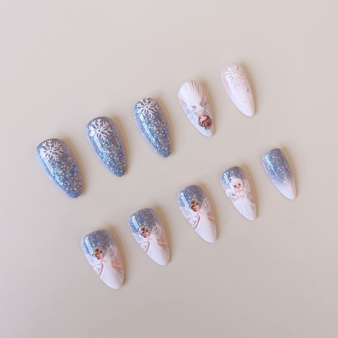Nail art set with enchanting fairy motifs and glitter accents Bowlift