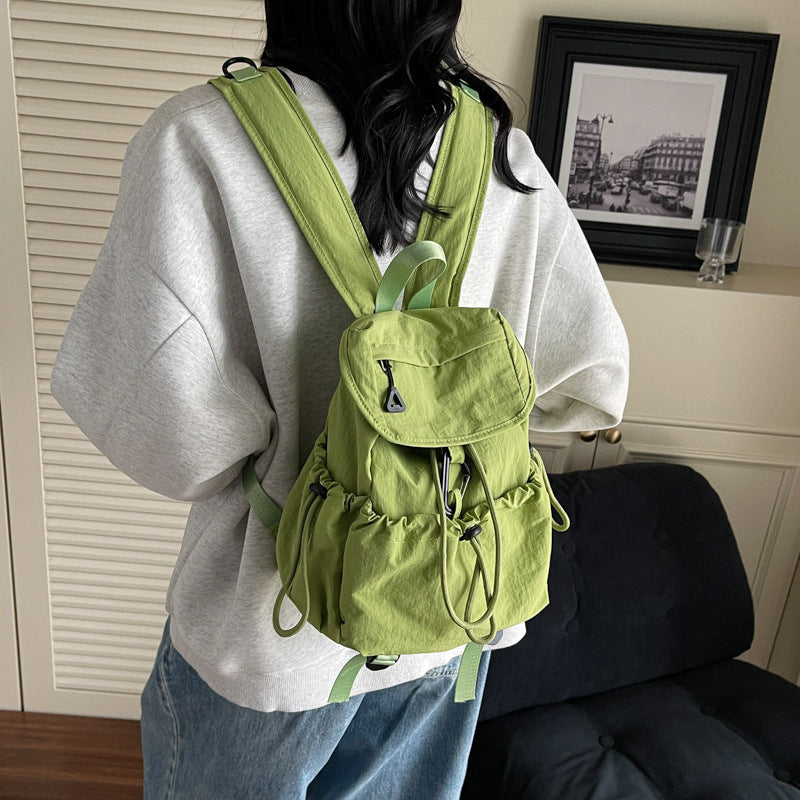 Leisure backpack with elastic drawstring and practical side pockets Bowlift