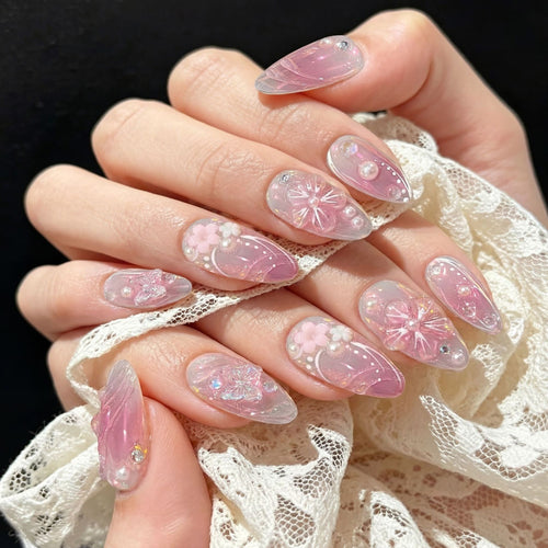 Acrylic nail set with elegant flower design and glitter accents Bowlift