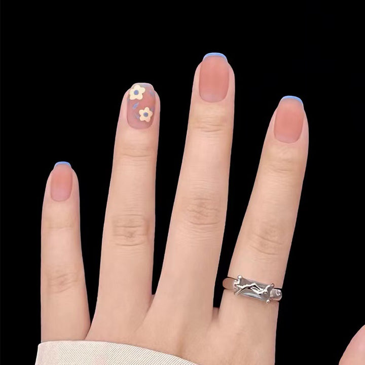 Creative nail design with floral accents Bowlift
