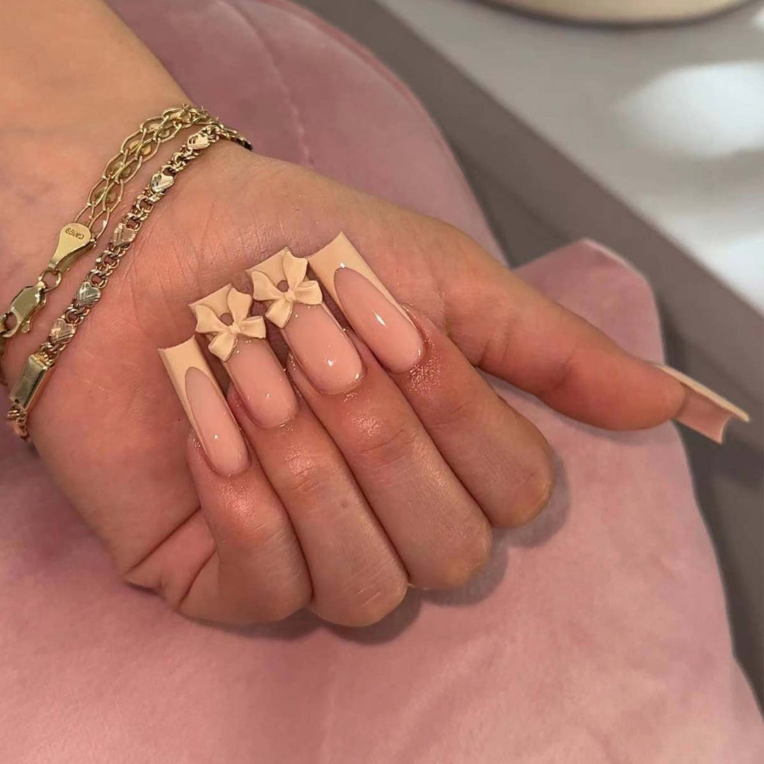 Artistic acrylic nails with bow decorations Bowlift