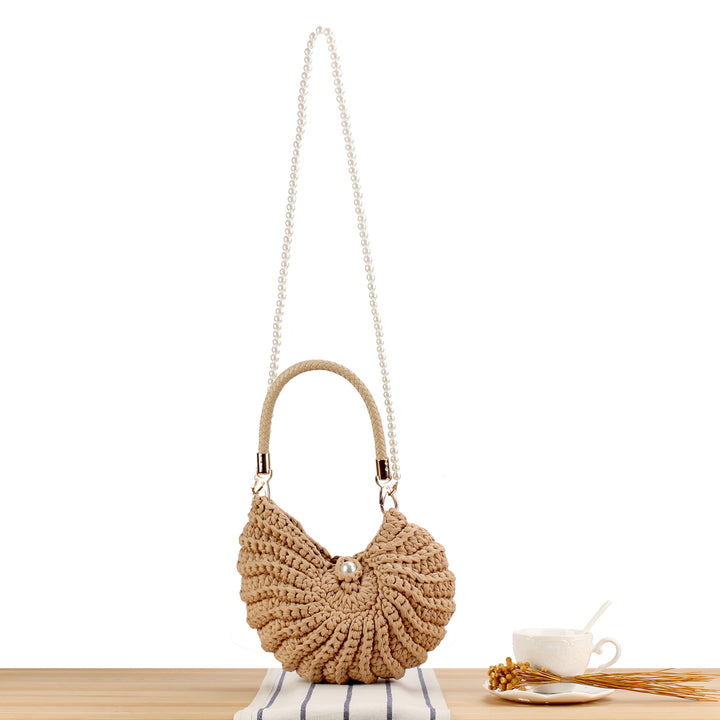 Evening bag with pearl decorated handle Bowlift