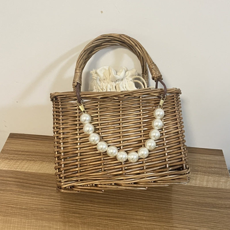 Ladies' basket bag with decorative pearl accents and bow decoration Bowlift