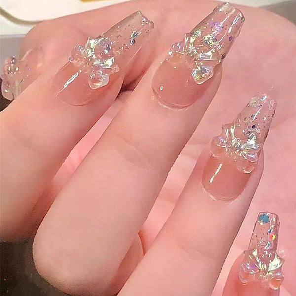Artificial nails in creative moon and star design Bowlift