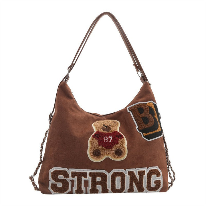 Shoulder bag in playful bear pattern Bowlift