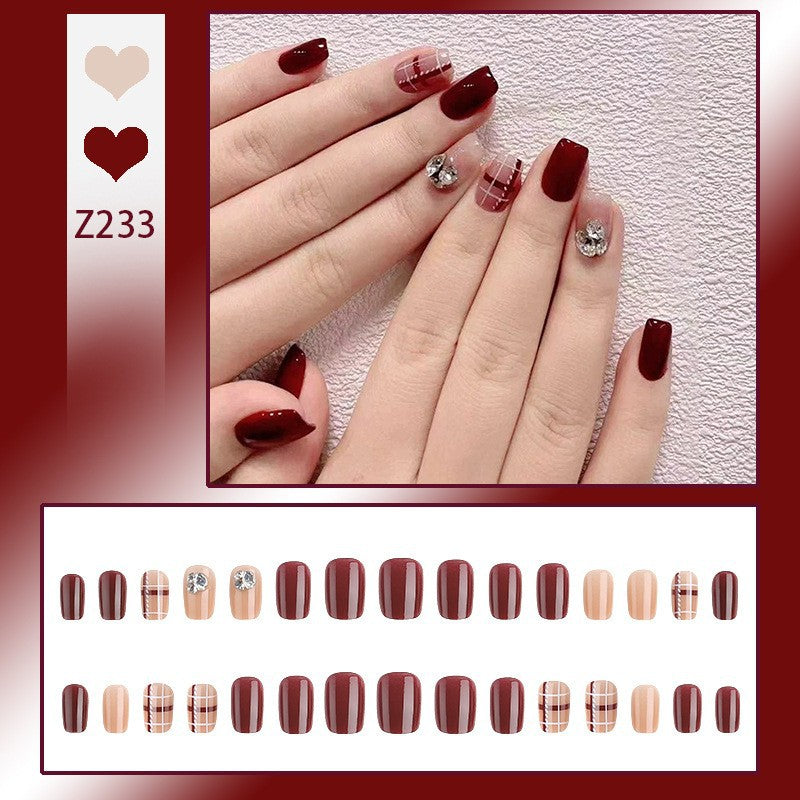 Artificial nail set with elegant, shimmering design and creative accents Bowlift