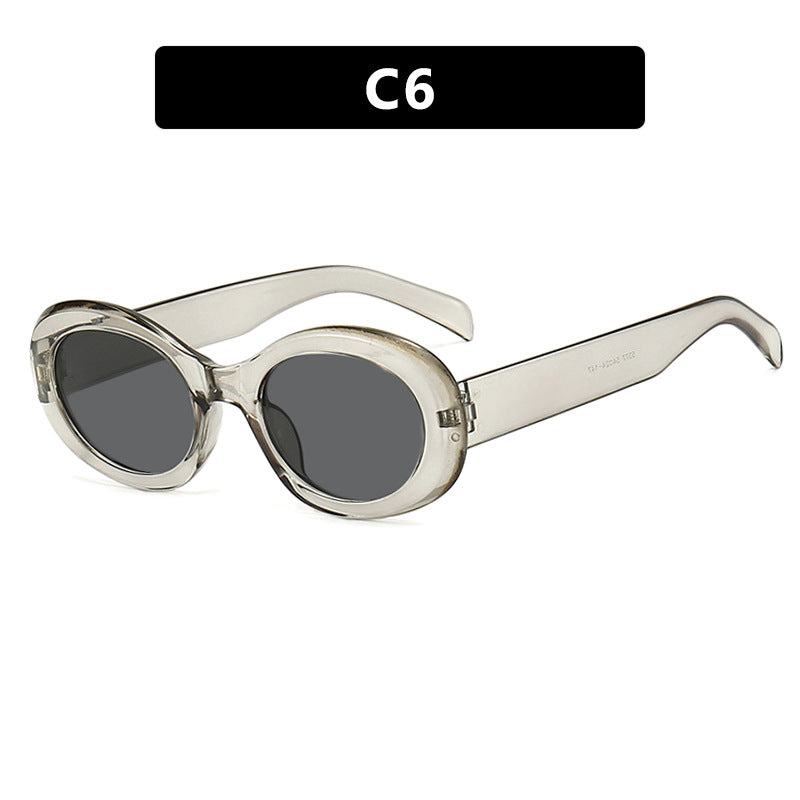 Women's fashionable sunglasses in original oval design with transparent frame and UV protection Bowlift