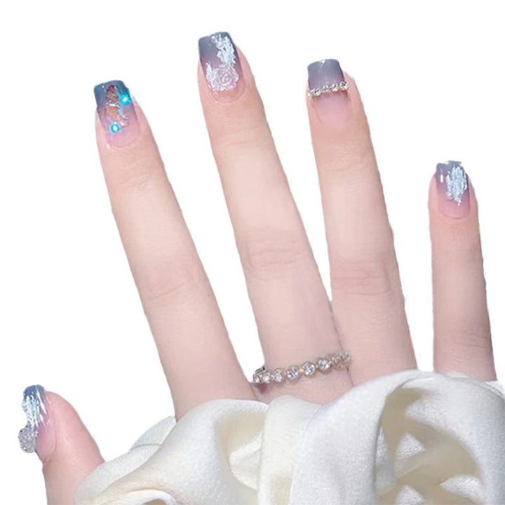 Glamorous artificial nails with heart and glitter details Bowlift