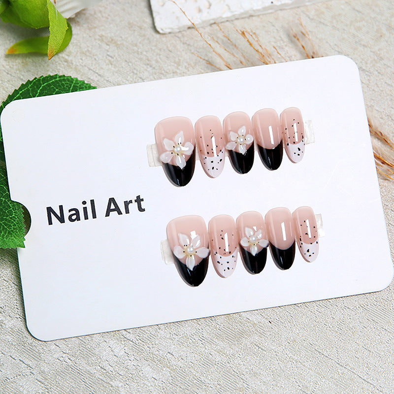 Artful nail tips with floral embellishments Bowlift