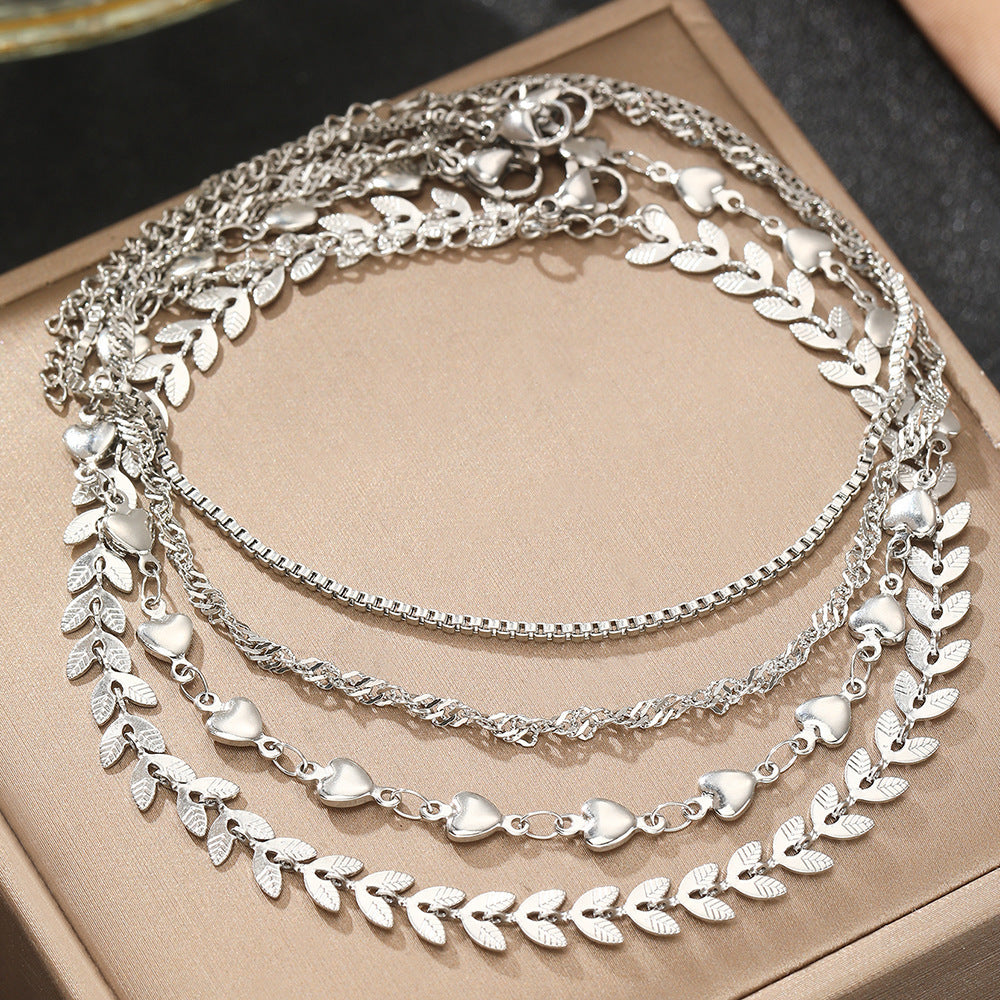 Elegant Layered Heart Charm Necklace Bowlift