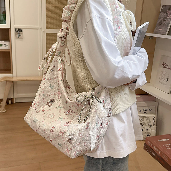Playful Character-Themed Hobo Bag Bowlift