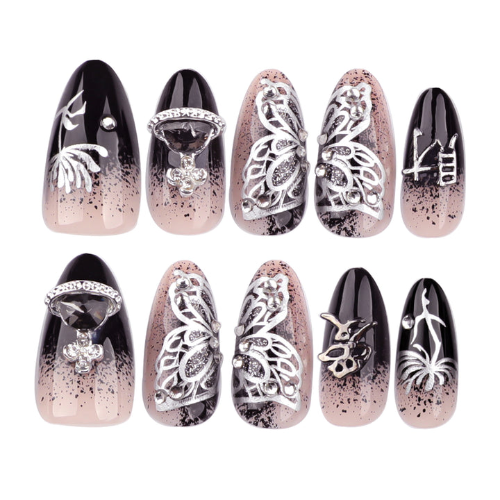 Artful stiletto nails with delicate embellishments and glamour accents Bowlift