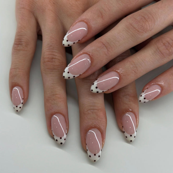 Artful manicure with elegant French tip Bowlift