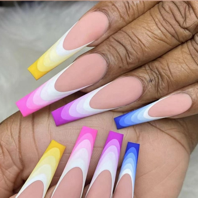 Artificial nails in luxurious ombre design with rhinestone accents Bowlift