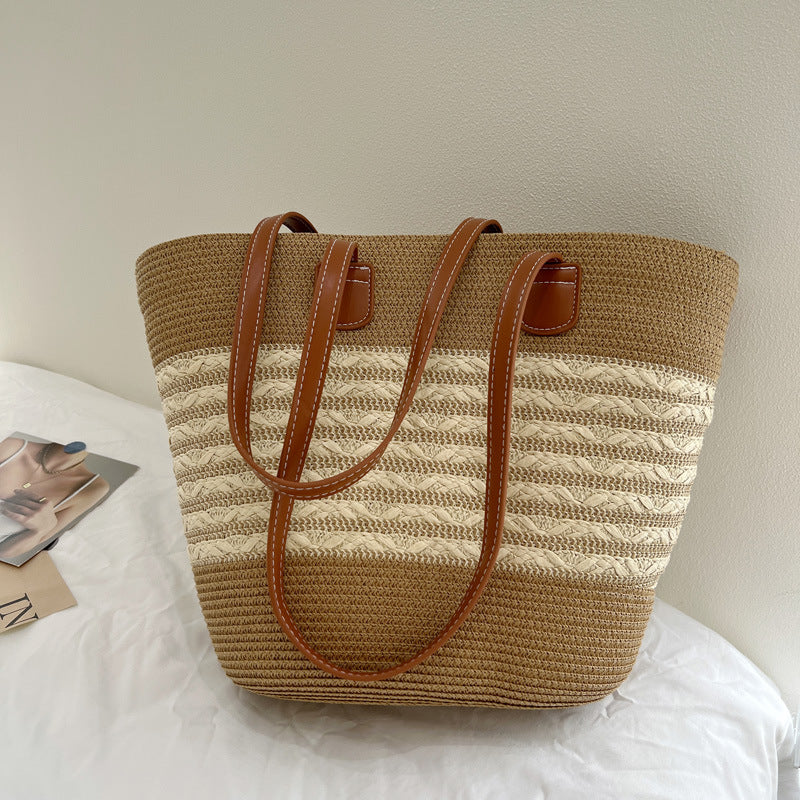 Handcrafted wicker bag with elegant leather accents Bowlift