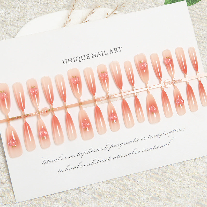 Nail set in elegant ombre design with artistic accents Bowlift