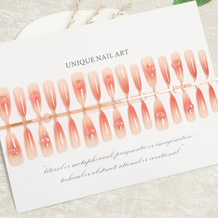 Nail set in elegant ombre design with artistic accents Bowlift