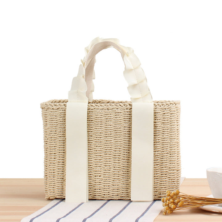 Playful basket bag with elegant fabric handle Bowlift