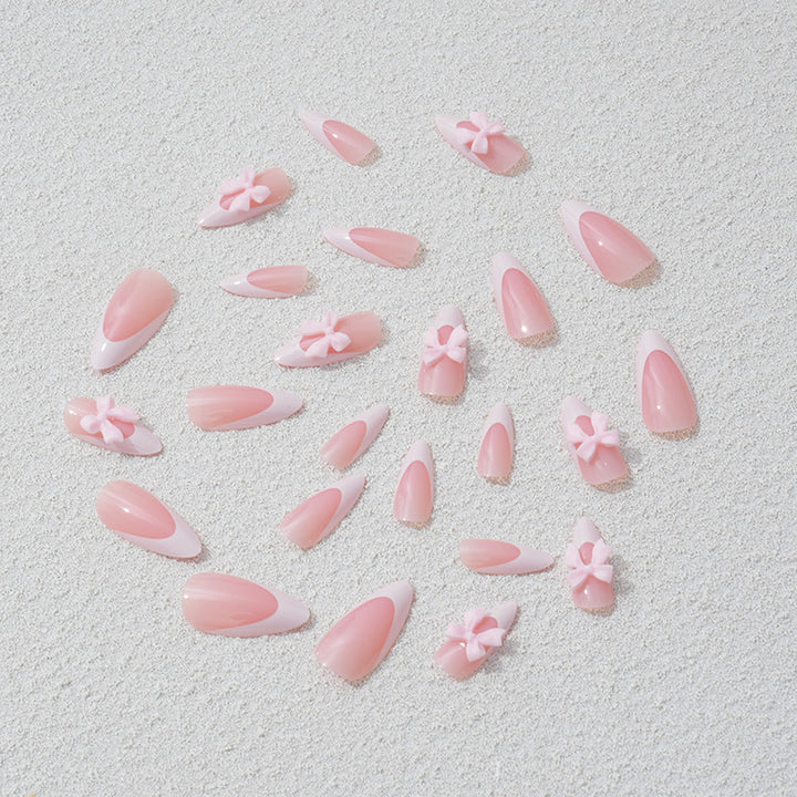 Nail art set with playful bow accents Bowlift
