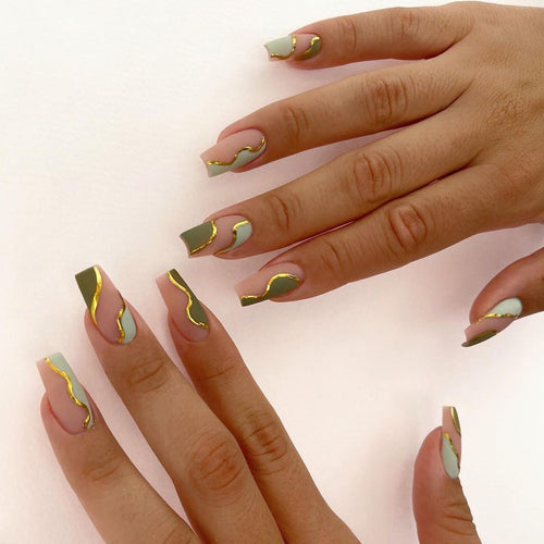 Artful Nail Extensions with Elegant Gold Decoration Design Bowlift