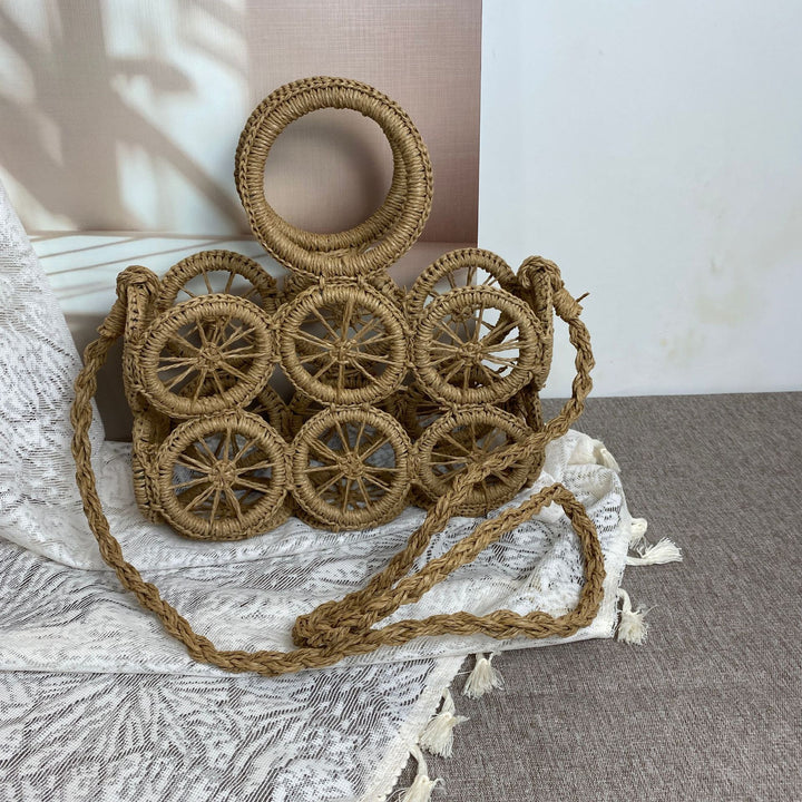 Artisan woven basket bag with striking wheel pattern Bowlift