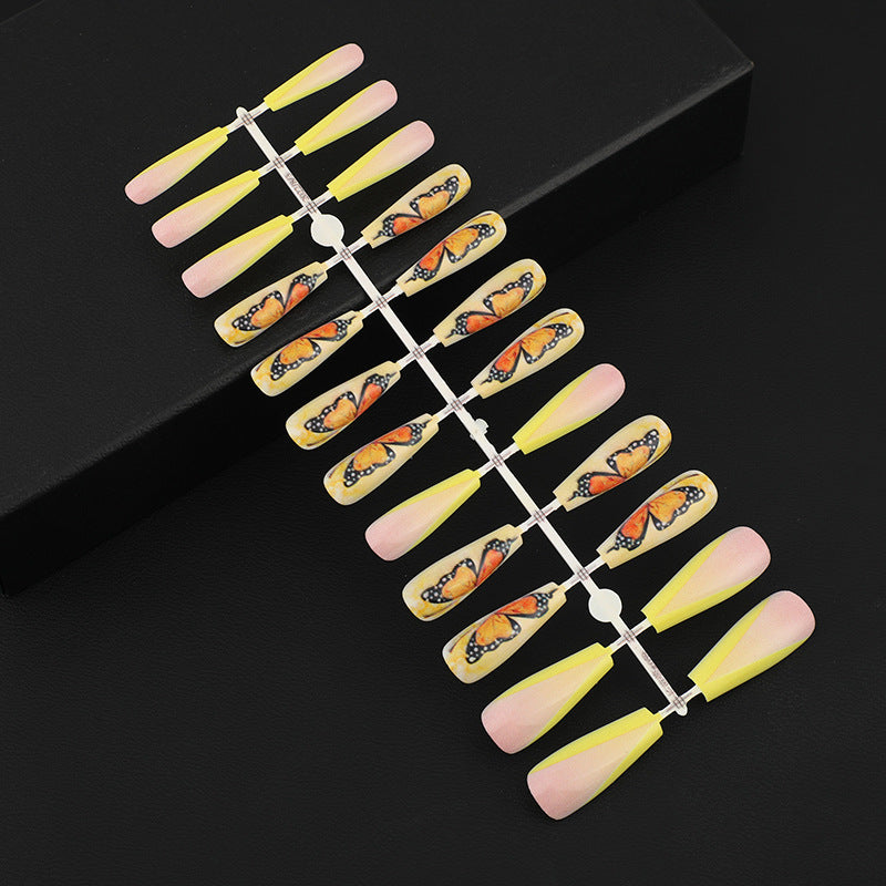Art nails with butterfly motif Bowlift