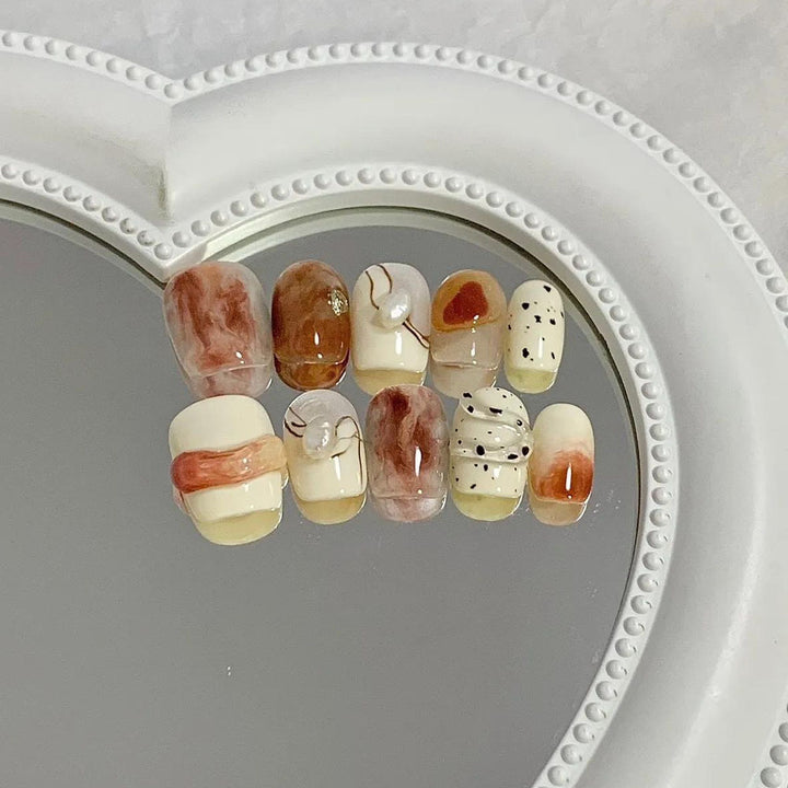 Artificial Nail Set with Marbled Design and Glitter Effects Bowlift