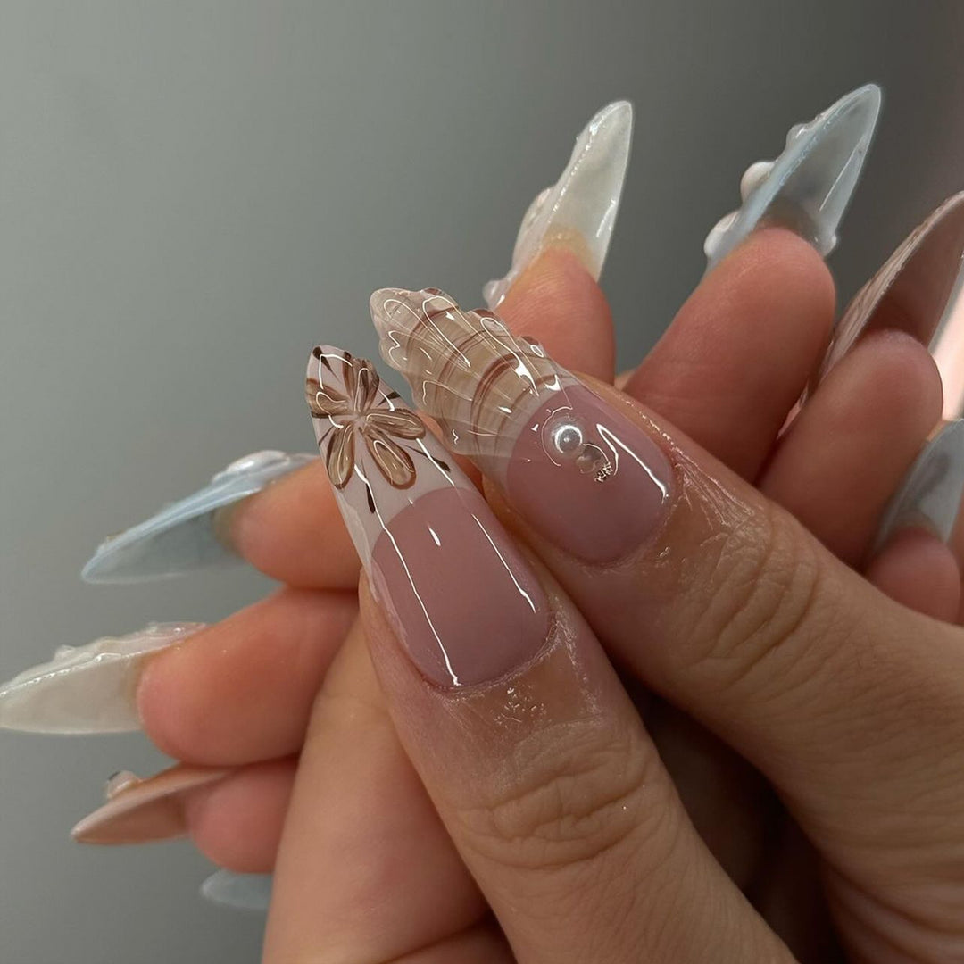 Artistic Press-On Nail Set with Shell and Floral Accents Bowlift