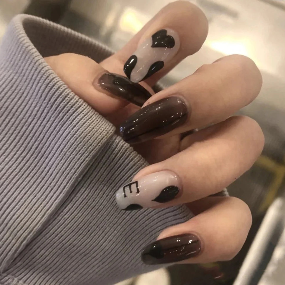 Artful Gel Nails with Elegant Floral Design and Glitter Accents Bowlift