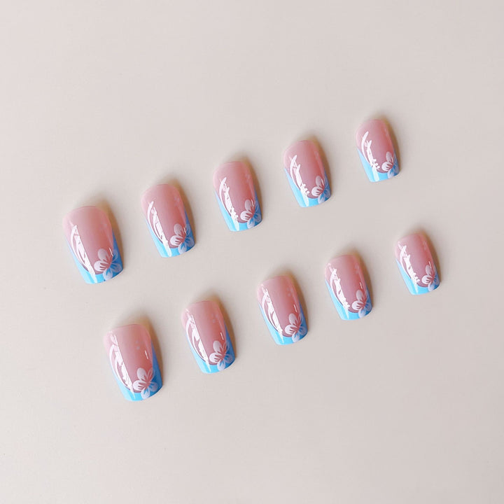 Acrylic nail set with floral designs and elegant tips Bowlift