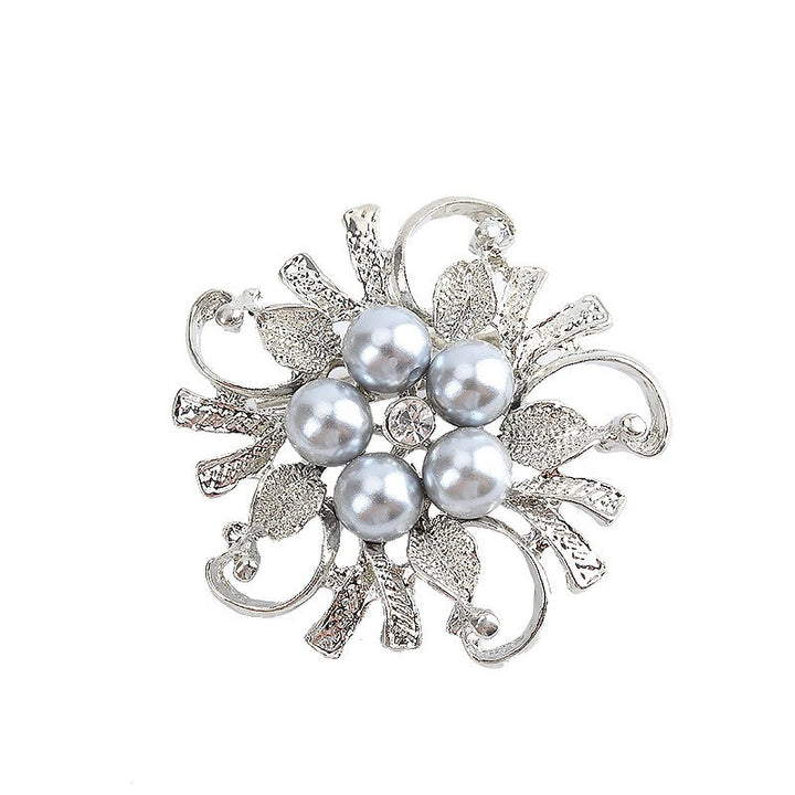 Glamorous brooch with pearl set Bowlift