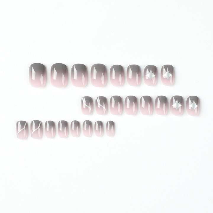 Artificial nail art with elegant ombre design and charming accents Bowlift