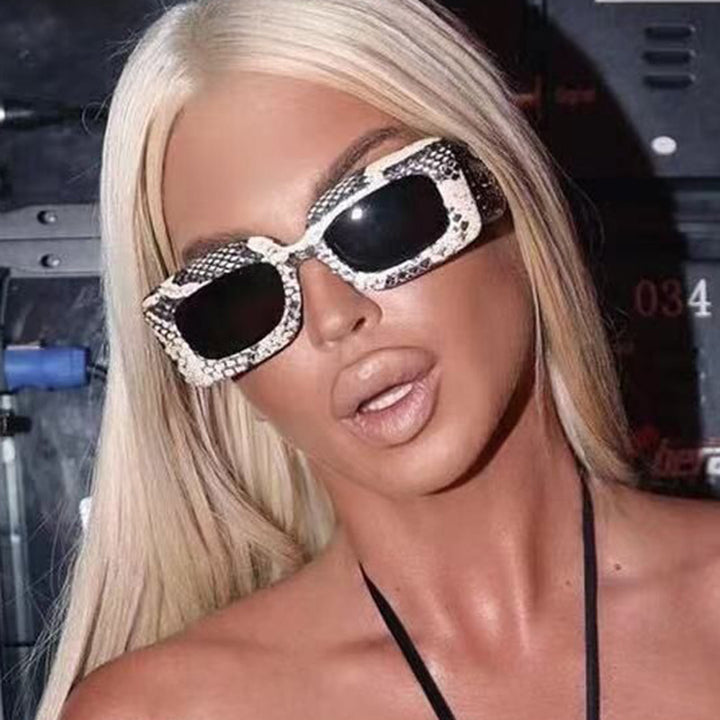 Women oversized sunglasses in fashionable snake leather look Bowlift