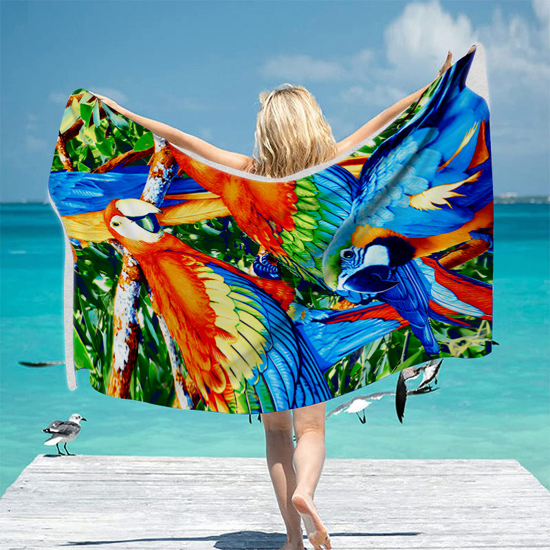 Beach towel with vibrant tropical motif Bowlift