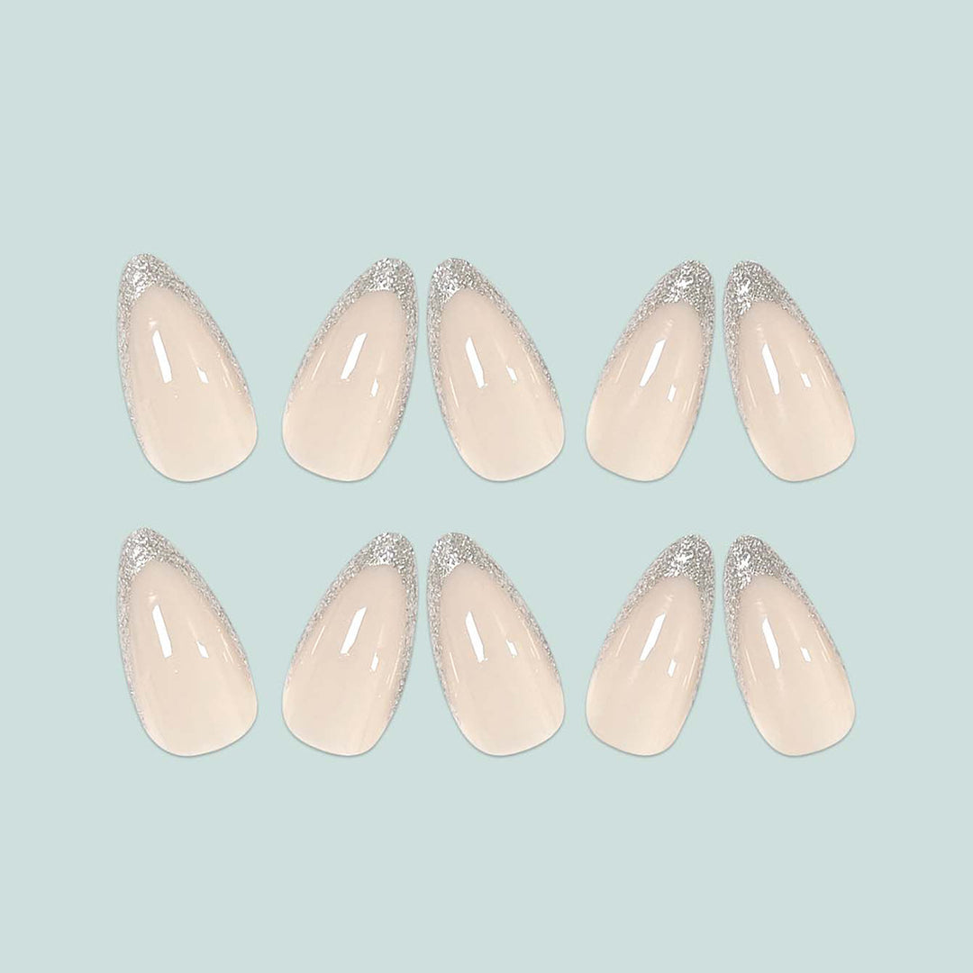 Glamorous stiletto artificial nails with glitter tips Bowlift