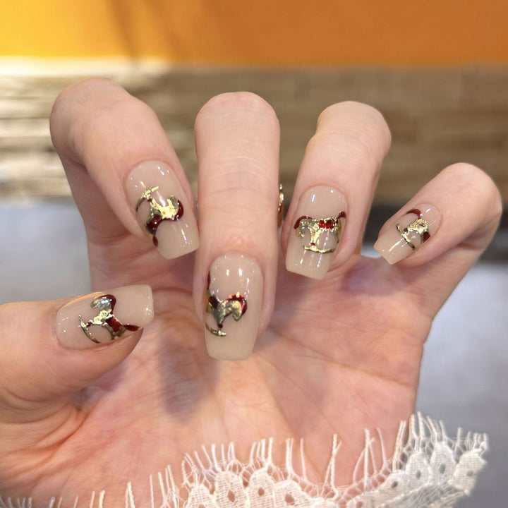 Decorative Press-On Nail Art Set with Gold Accent Designs Bowlift