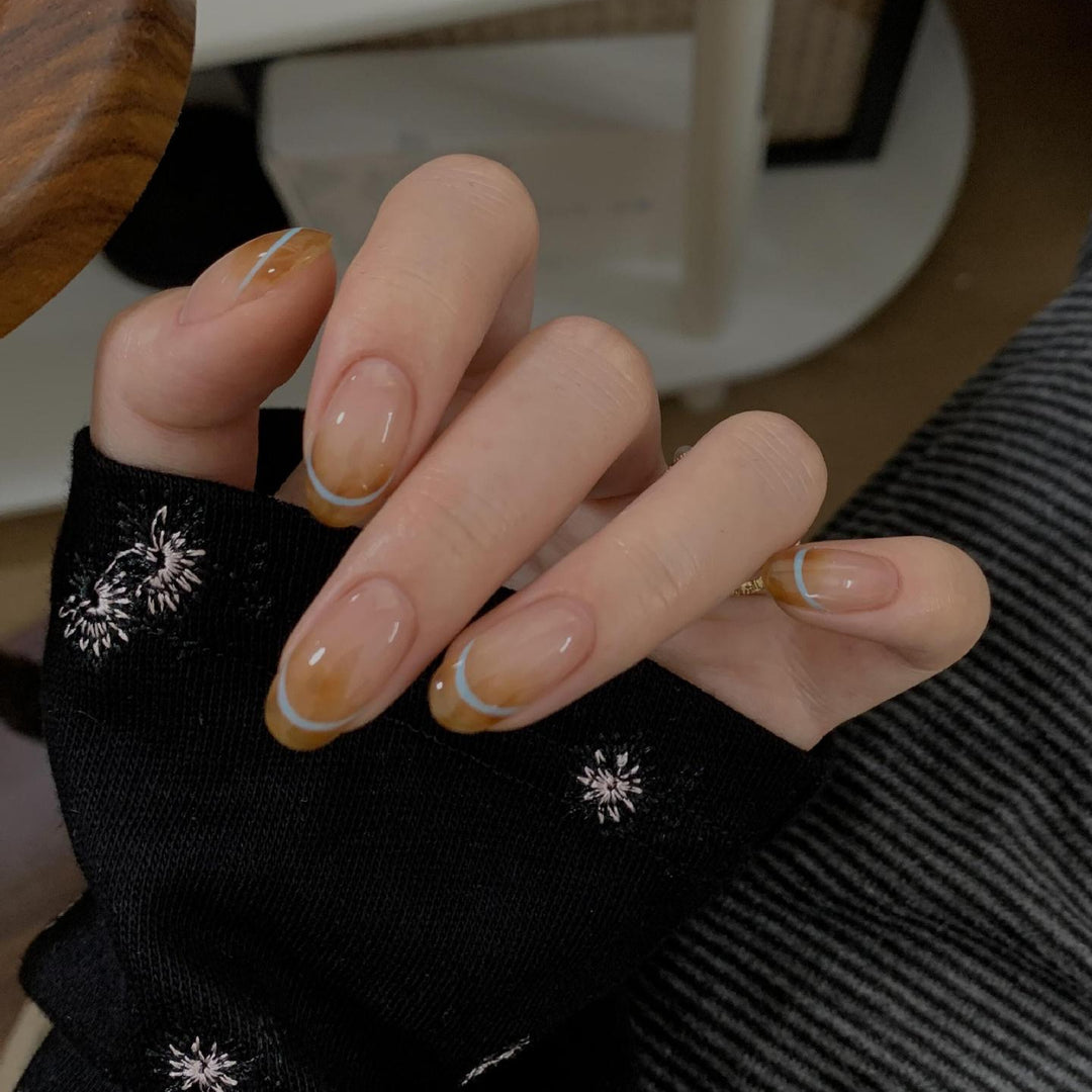 Artificial nails with modern French manicure design Bowlift